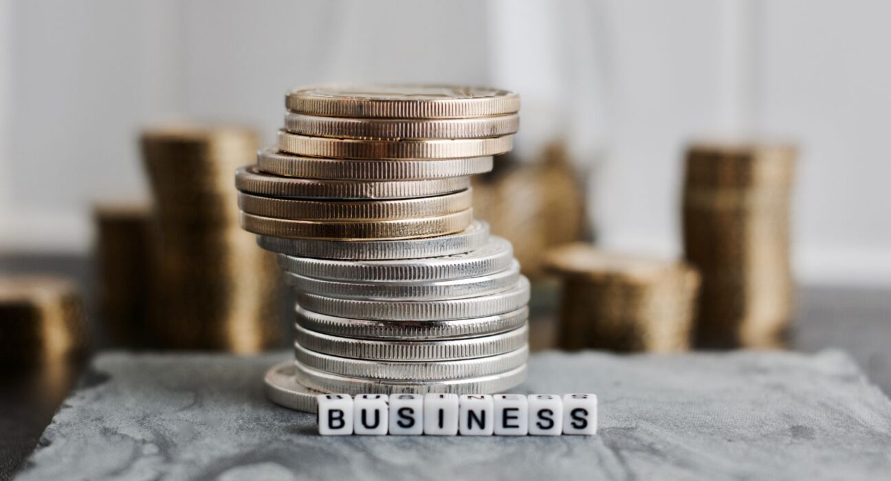 Business money illustrated using coins and the word "business"