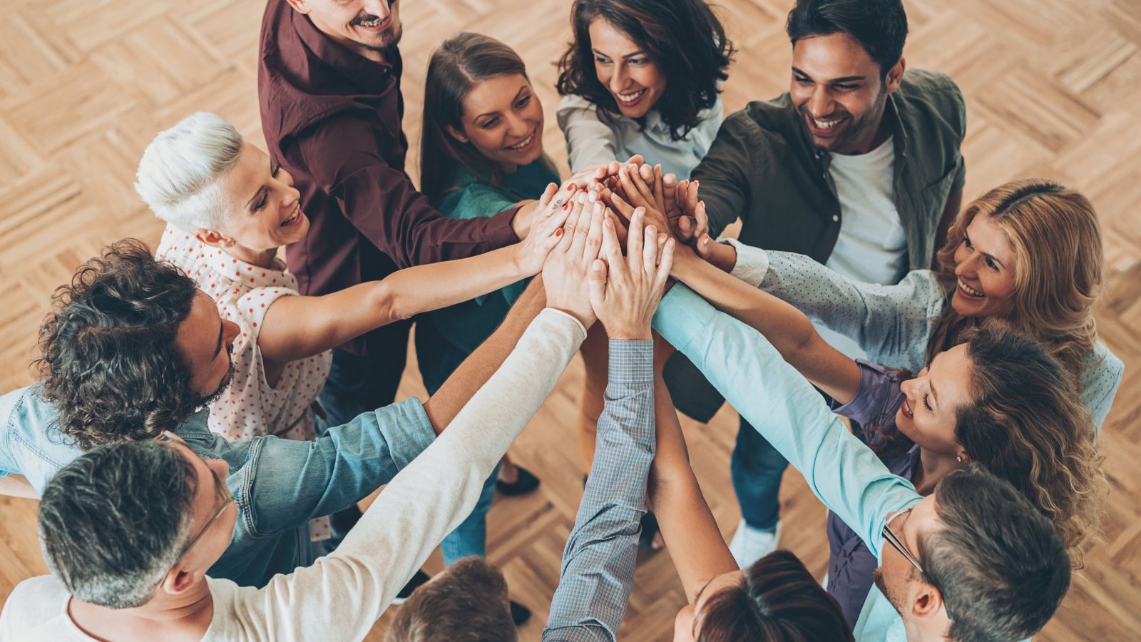 A business team celebrating after taking steps to set themselves for success