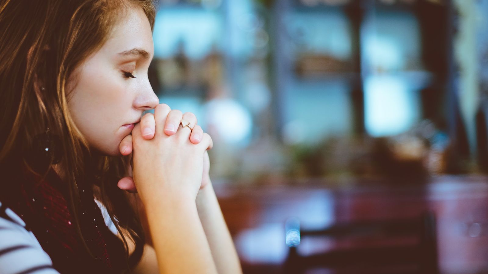 A woman (with eyes closed) thinking about how to use failures as a strategy to succeed