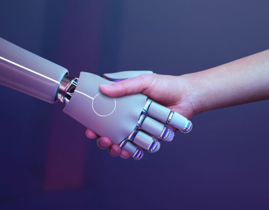 Jasper AI for Business- robot handshake with a robot