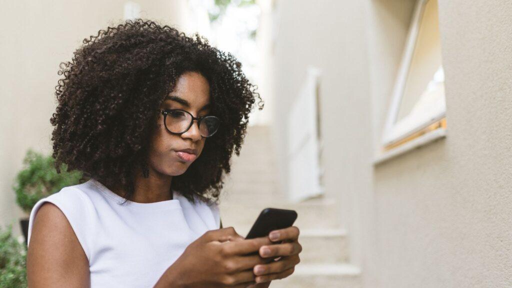 women looking at phone